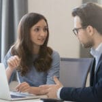 man consulting to a women about accounting and cfo services